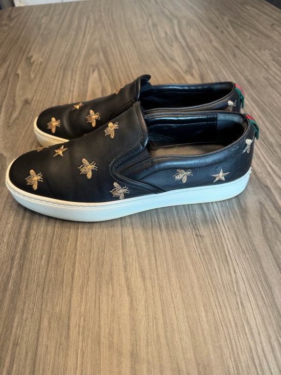 Gucci Black Leather Slip-On Sneakers with Gold Bee & Star Embroidery